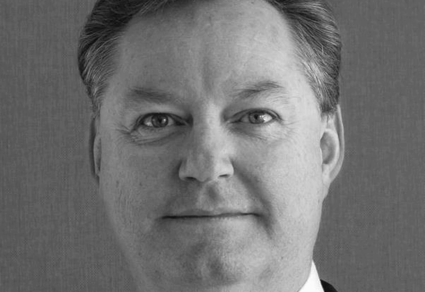 Black a white portrait image of Fendall Hill