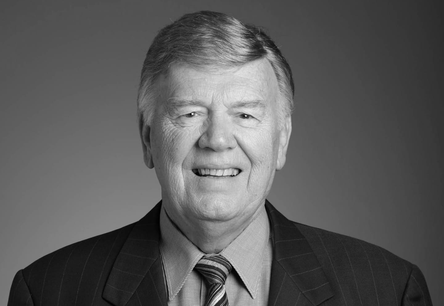Black a white portrait image of Kevin Radbourne